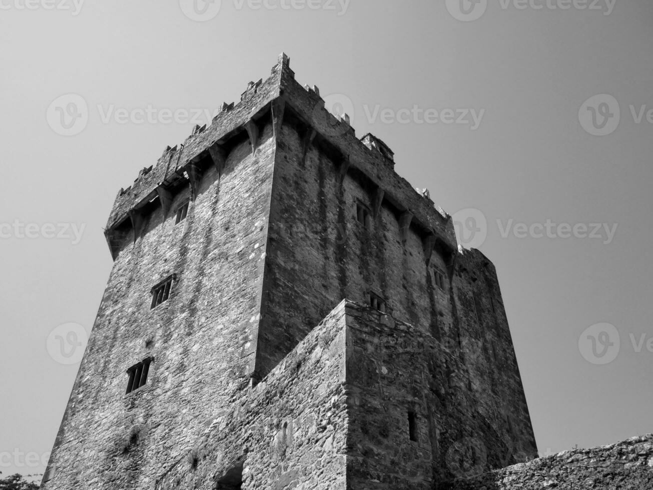 Ancient tower background, Blarney castle in Ireland, celtic fortress photo