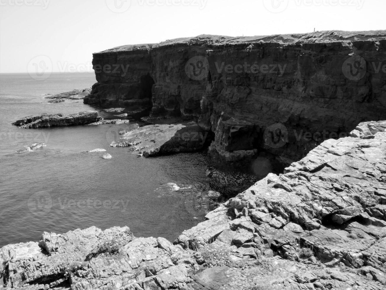 Cliffs and Atlantic ocean, rocks canyon and laguna, beauty in nature. Vacation travel background photo