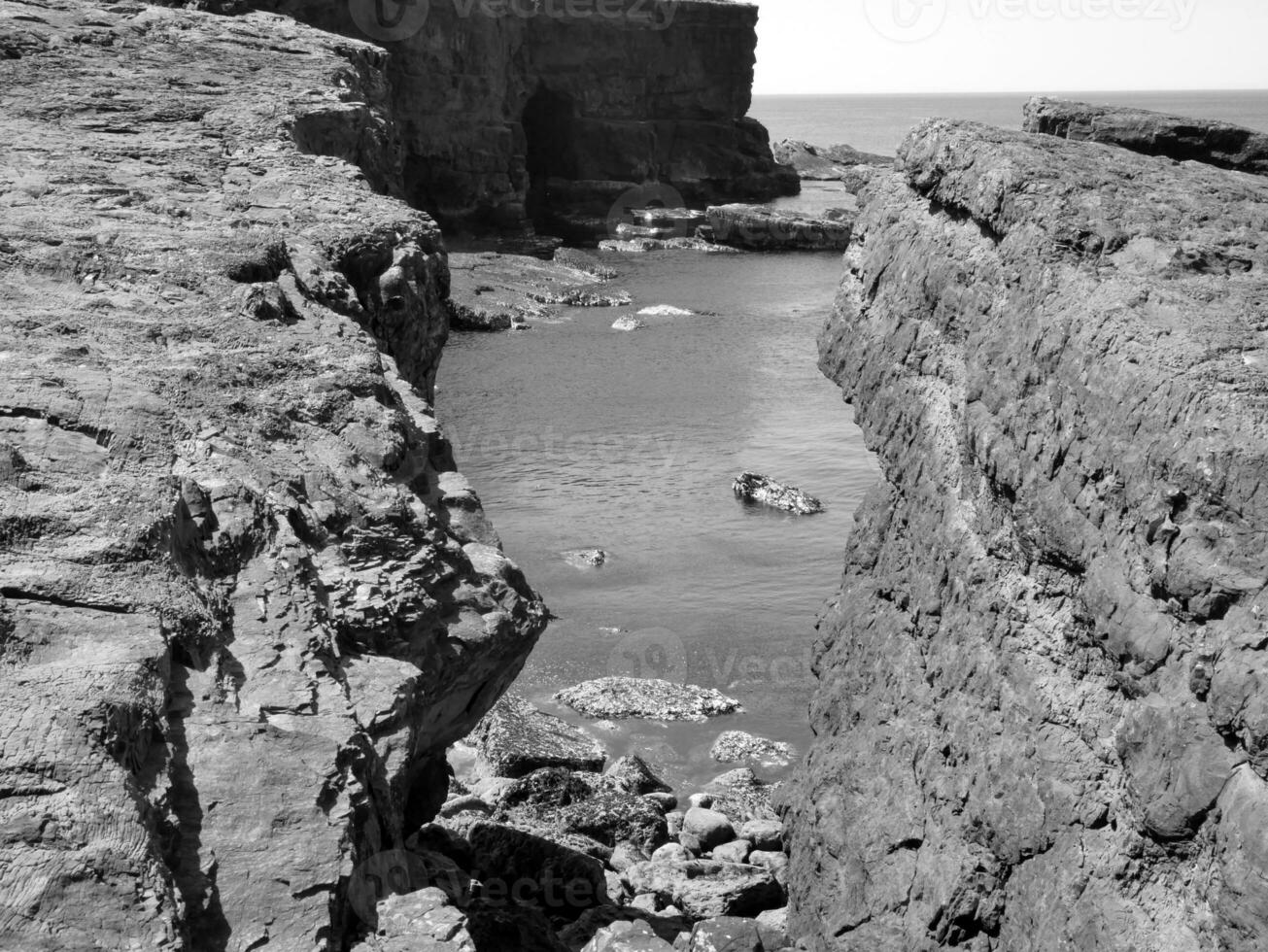 Cliffs and Atlantic ocean, rocks canyon and laguna, beauty in nature. Vacation travel background photo