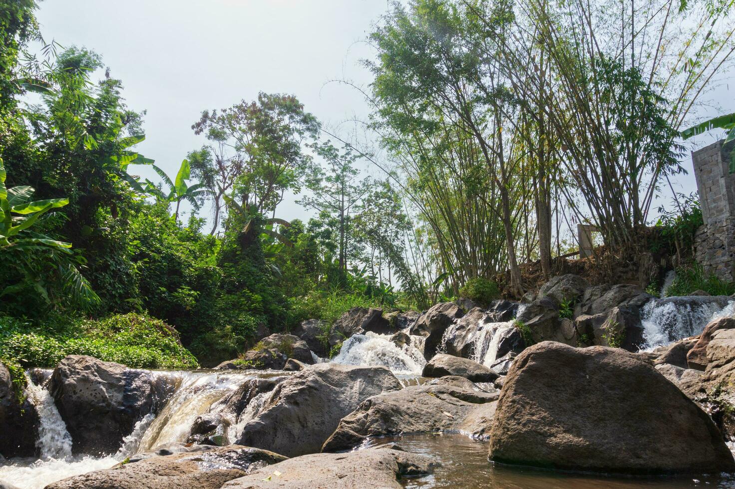 Coban Kali Lanang is a waterfall spot in Batu City, East Java, Indonesia photo