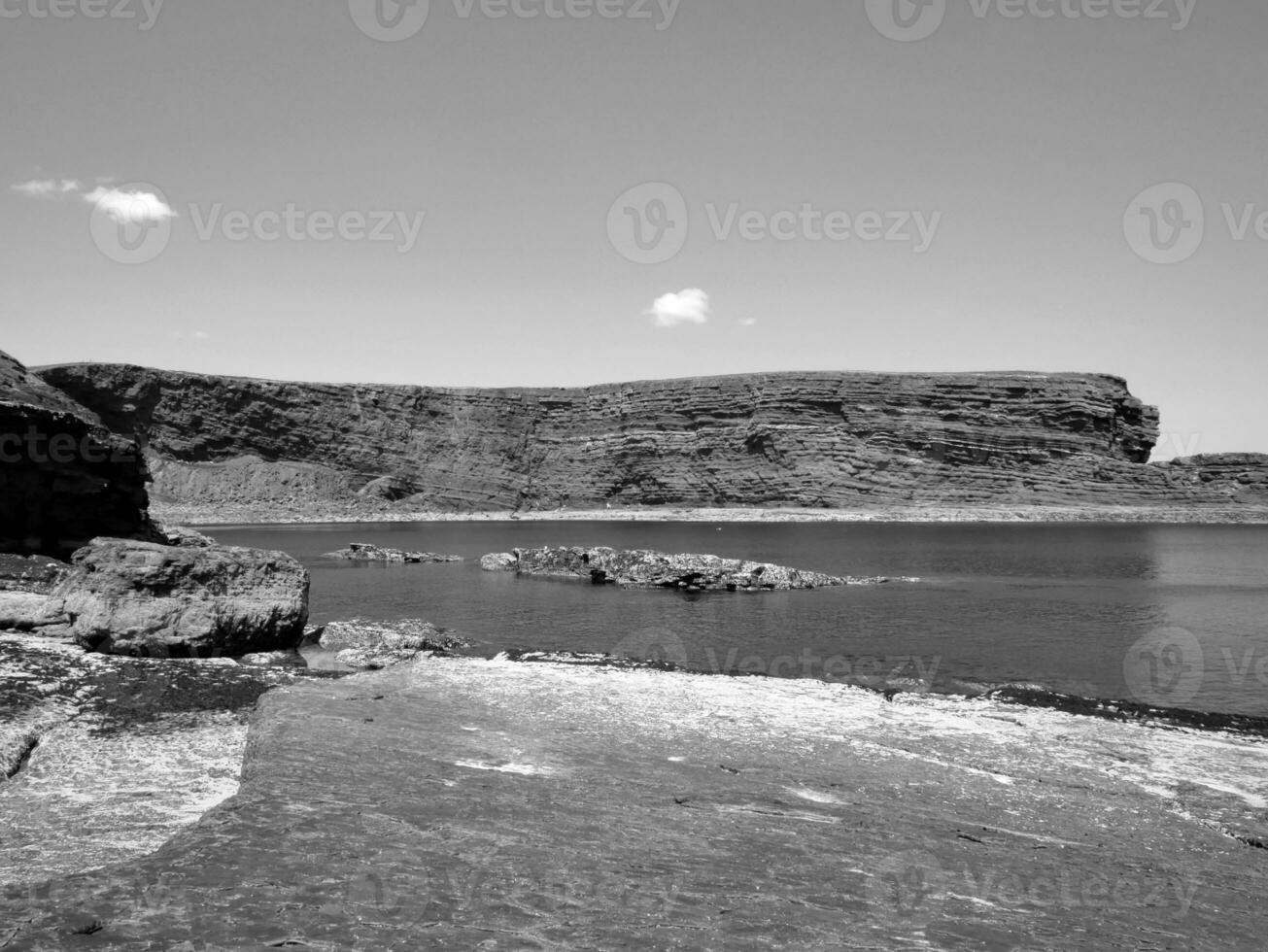 Cliffs and Atlantic ocean, clouds, rocks and laguna, beauty in nature. Vacation trip relaxation background photo