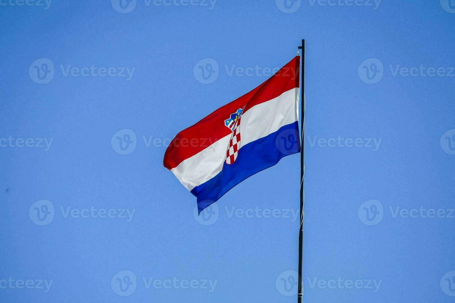 the croatian flag flying high in the sky photo