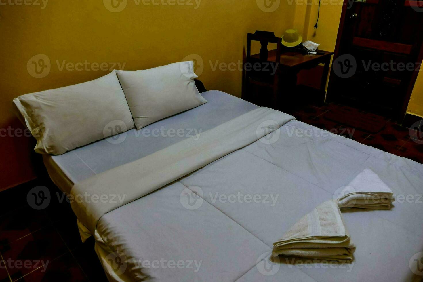 a bed or beds in a room at hotel la casa photo