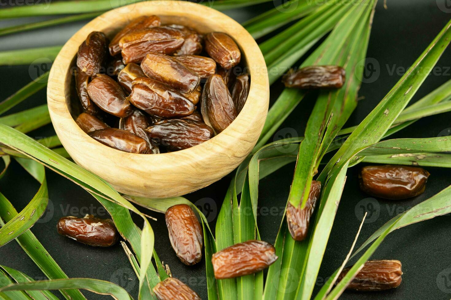Fruits of the date palm Phoenix dactylifera and bacon photo