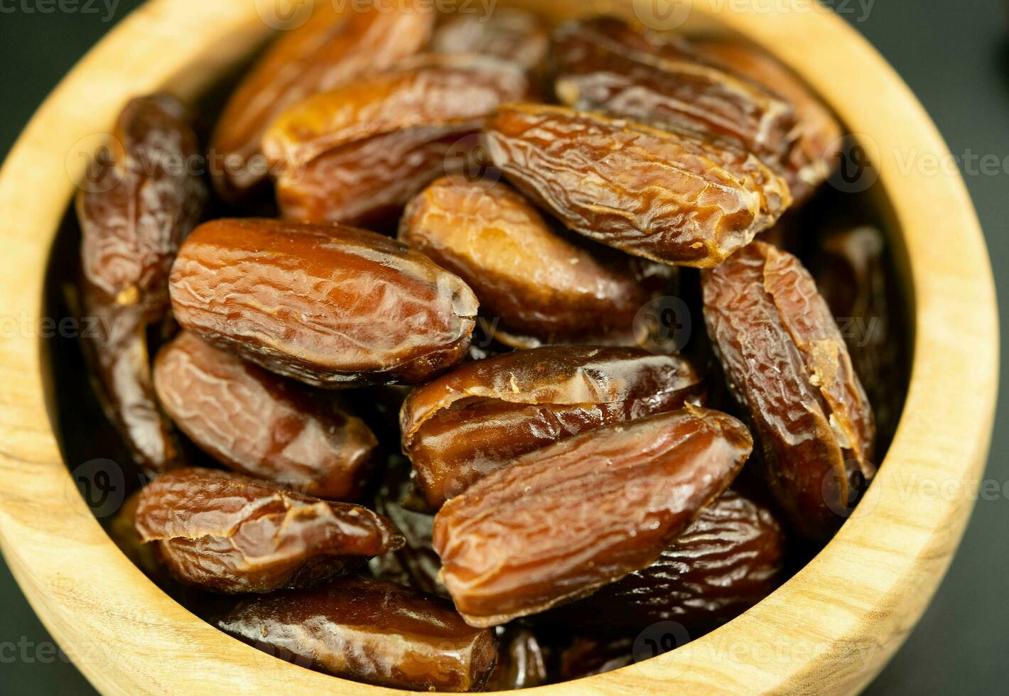 Fruits of the date palm Phoenix dactylifera and bacon photo