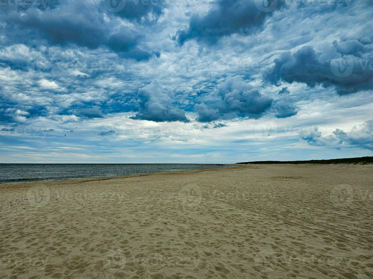 Impressions of the endless beach at the northern sea in Blavand Denmark photo