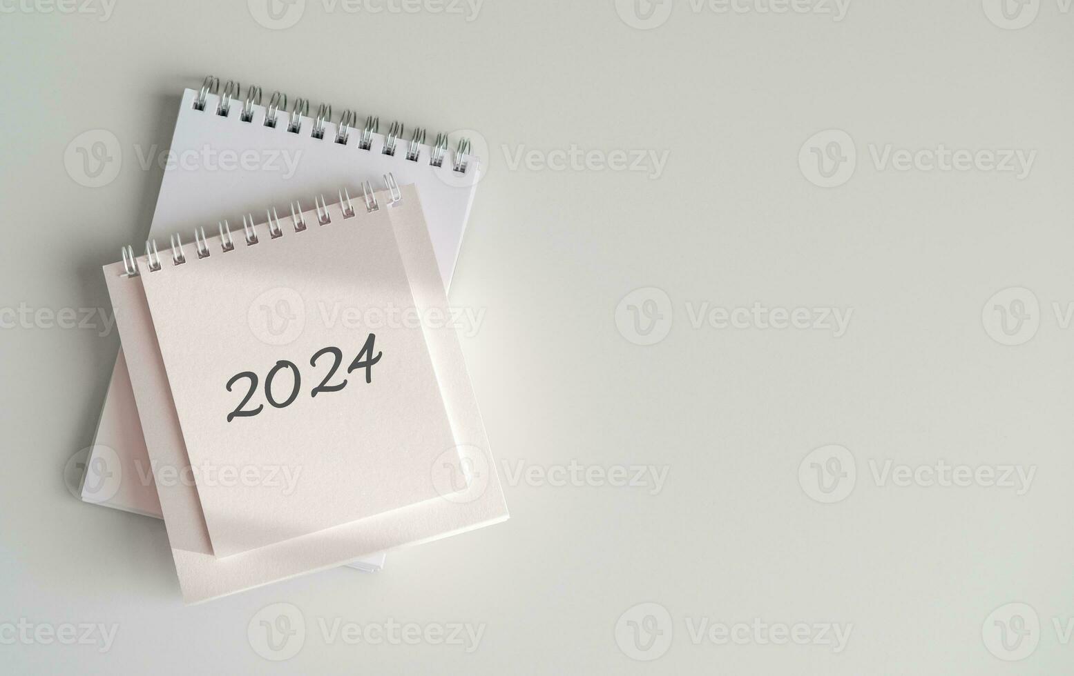 Top view of calendar 2024 on white background photo