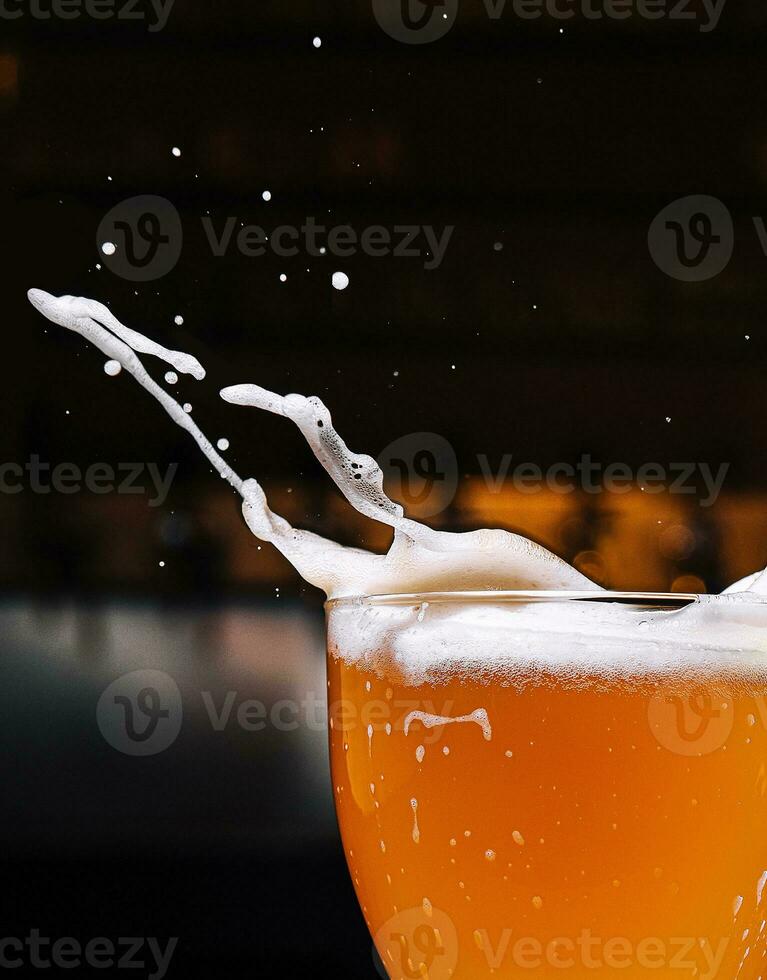 Glass of splashing beer close up photo