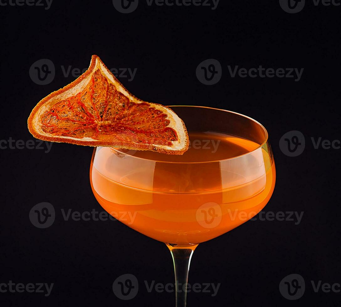Alcoholic cocktail in a glass with a slice of orange photo