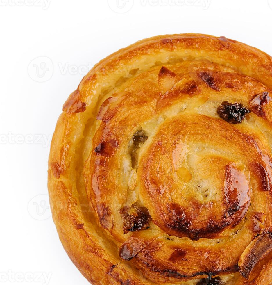 Homemade puff pastry bun with almond flakes photo