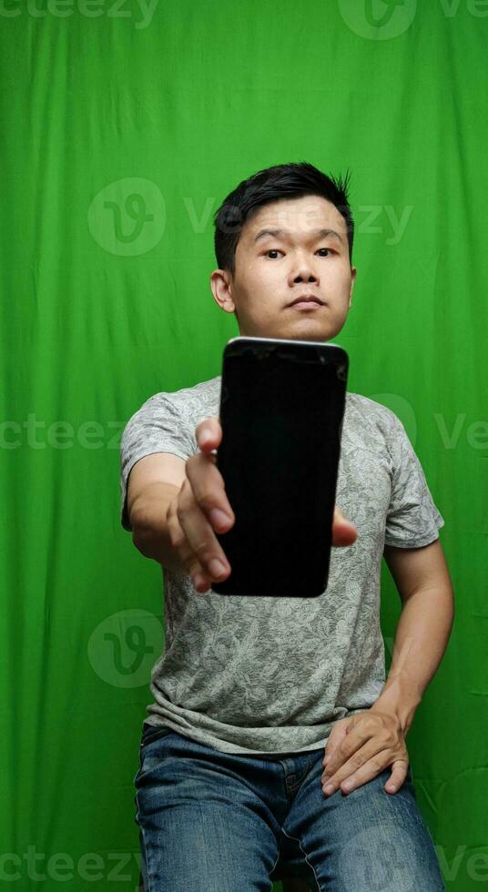 A Man Gesturing with Confidence and Direction by Pointing the Way photo
