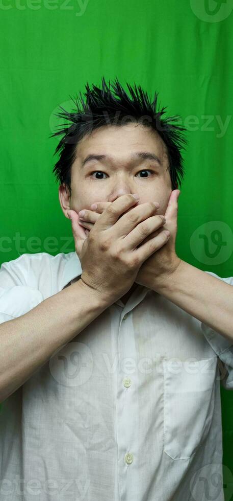A Man's Expression Reflecting Apprehension and Unease with his Fearful Gaze photo