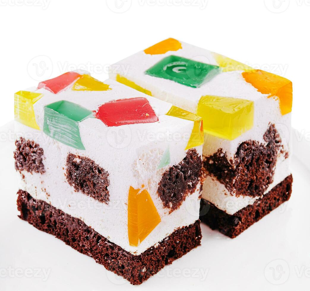 Jelly cake with colored fruits and berries inside photo