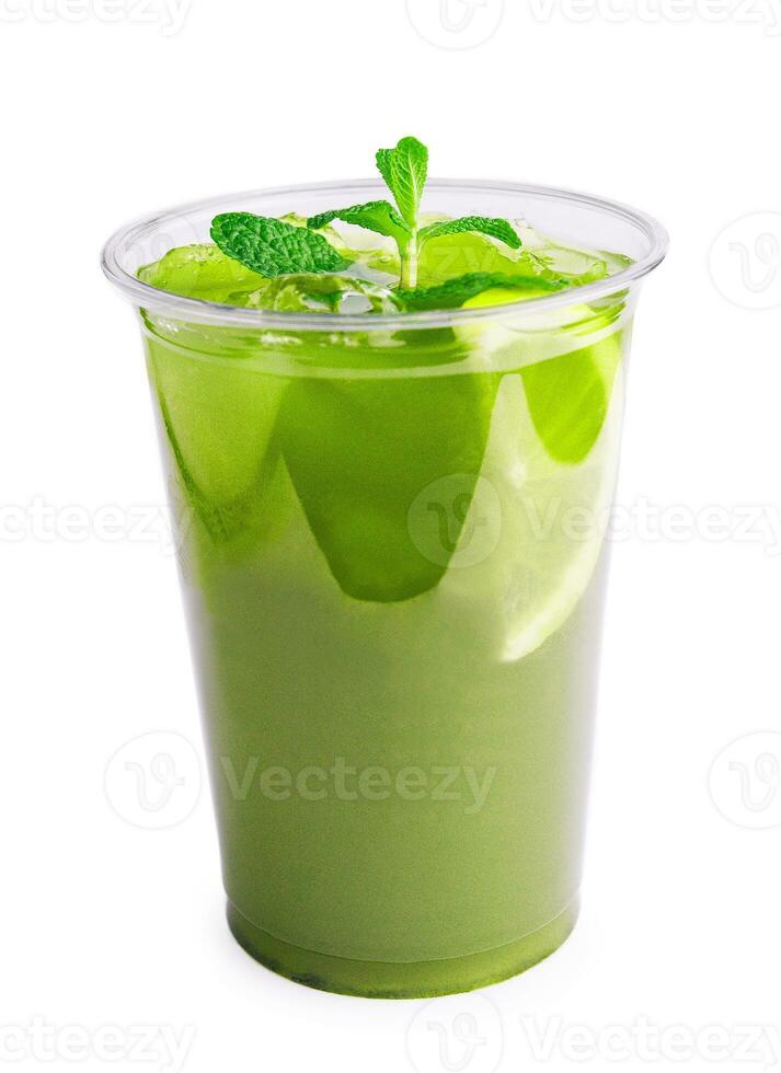 Tropical green cocktail with lemon and fresh mint photo