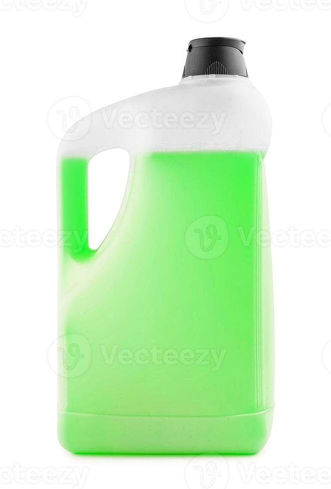 White plastic bottle with green liquid and a black cap photo