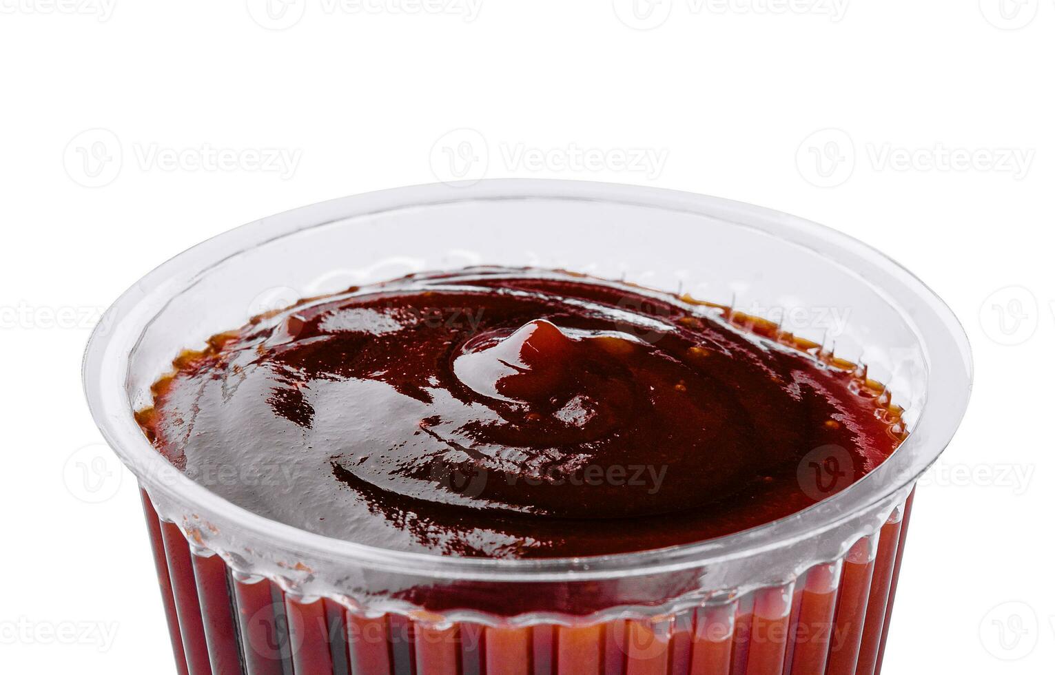 plastic dish of barbecue sauce on white background photo
