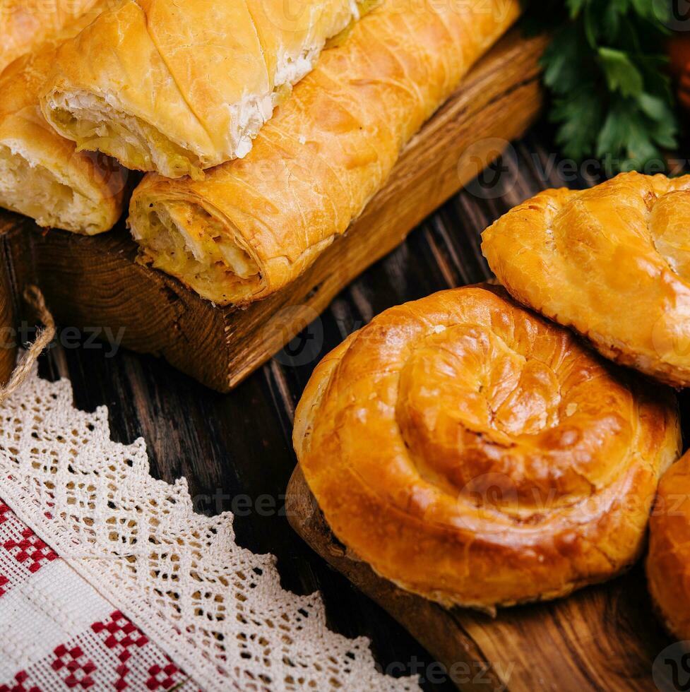 austrian dessert apple strudel on wooden board photo