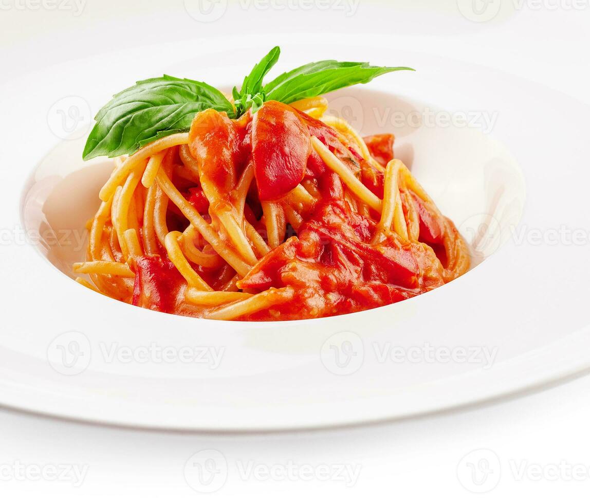 Spaghetti with tomato sauce and cherry tomatoes with basil photo