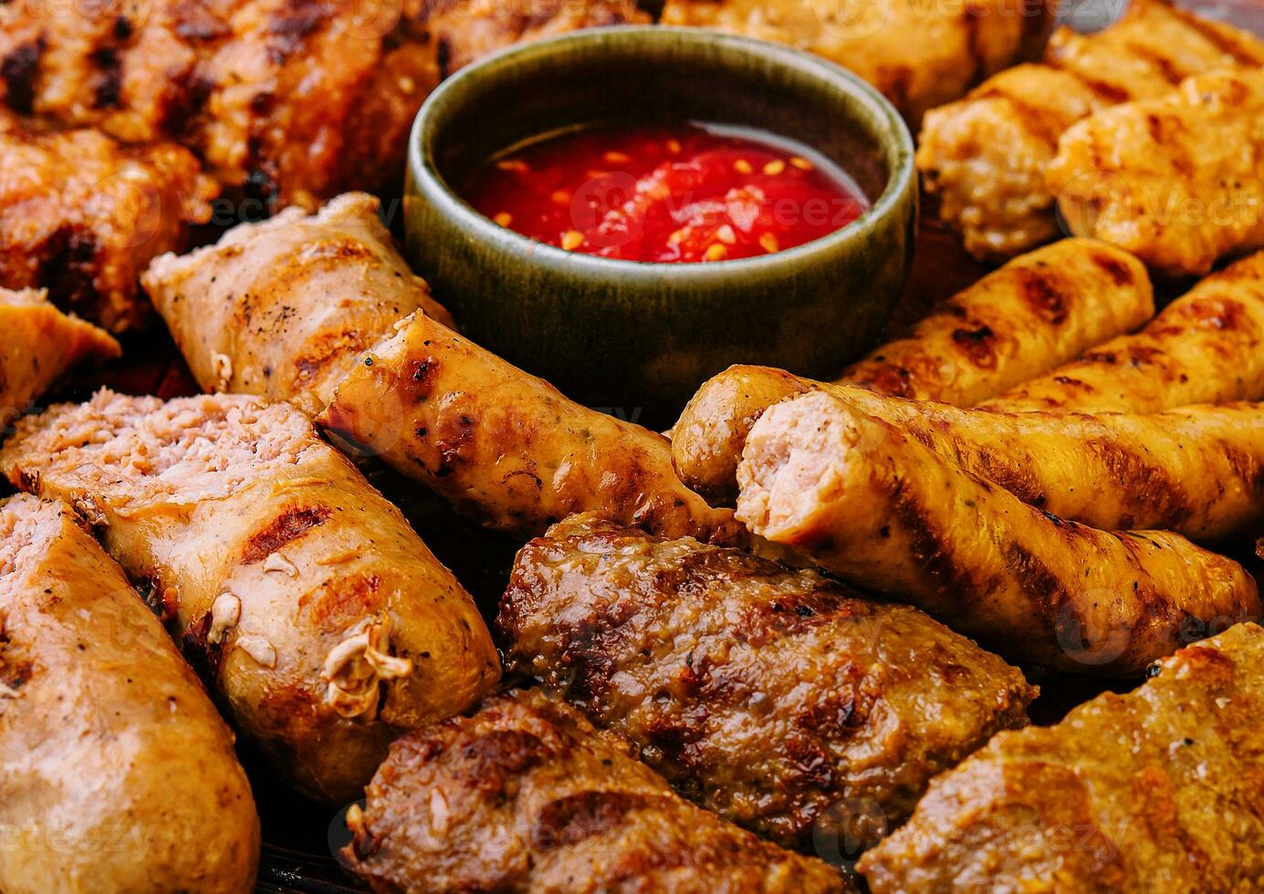 assorted barbecue of meat rolls or mici photo