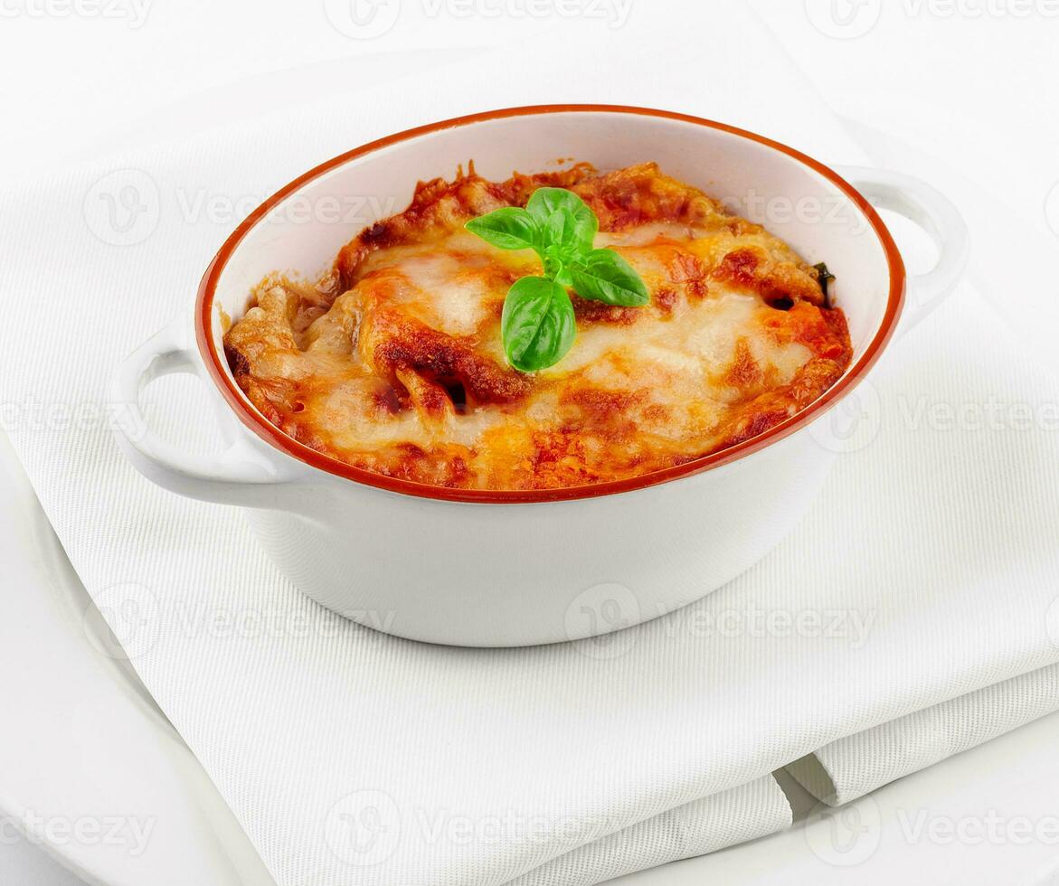 Lasagna in baking dish italian cuisine melted cheese photo