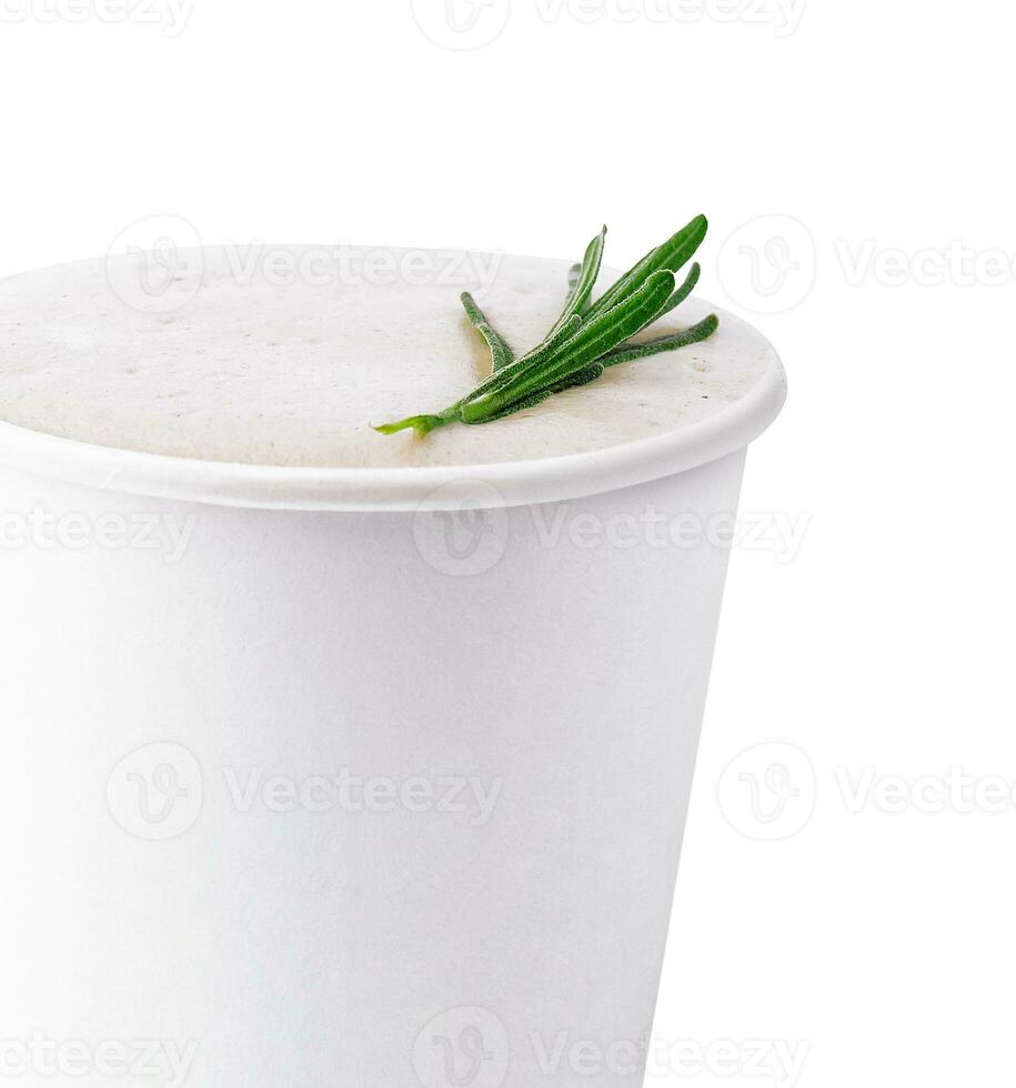 coffee latte decorated with rosemary sprig photo