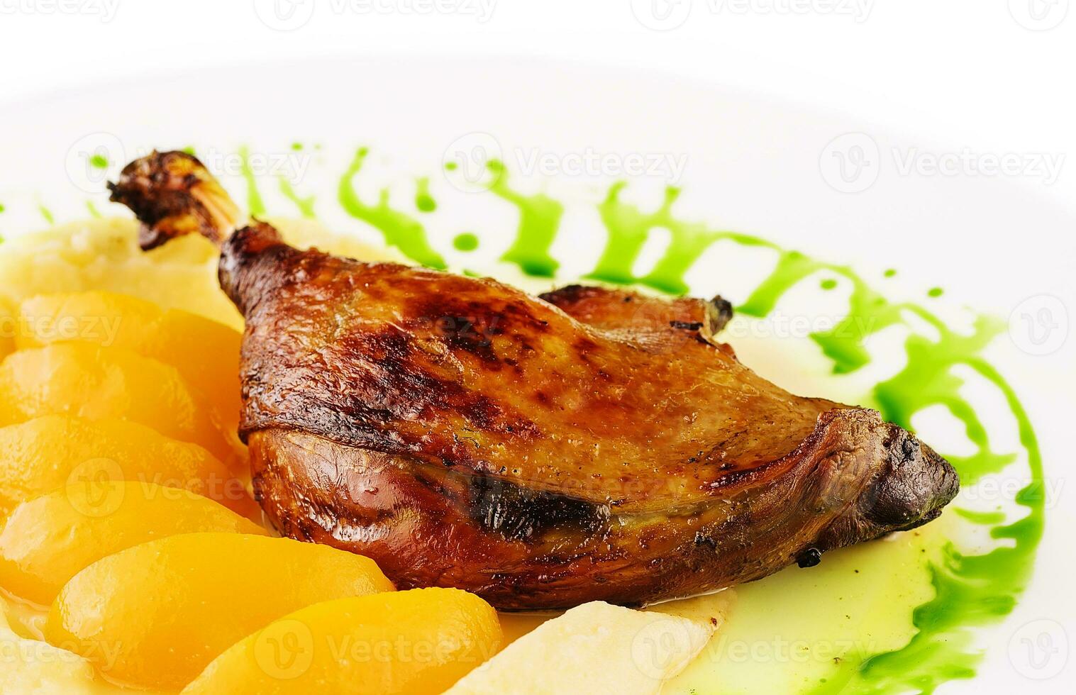 duck leg confit with mashed potatoes photo