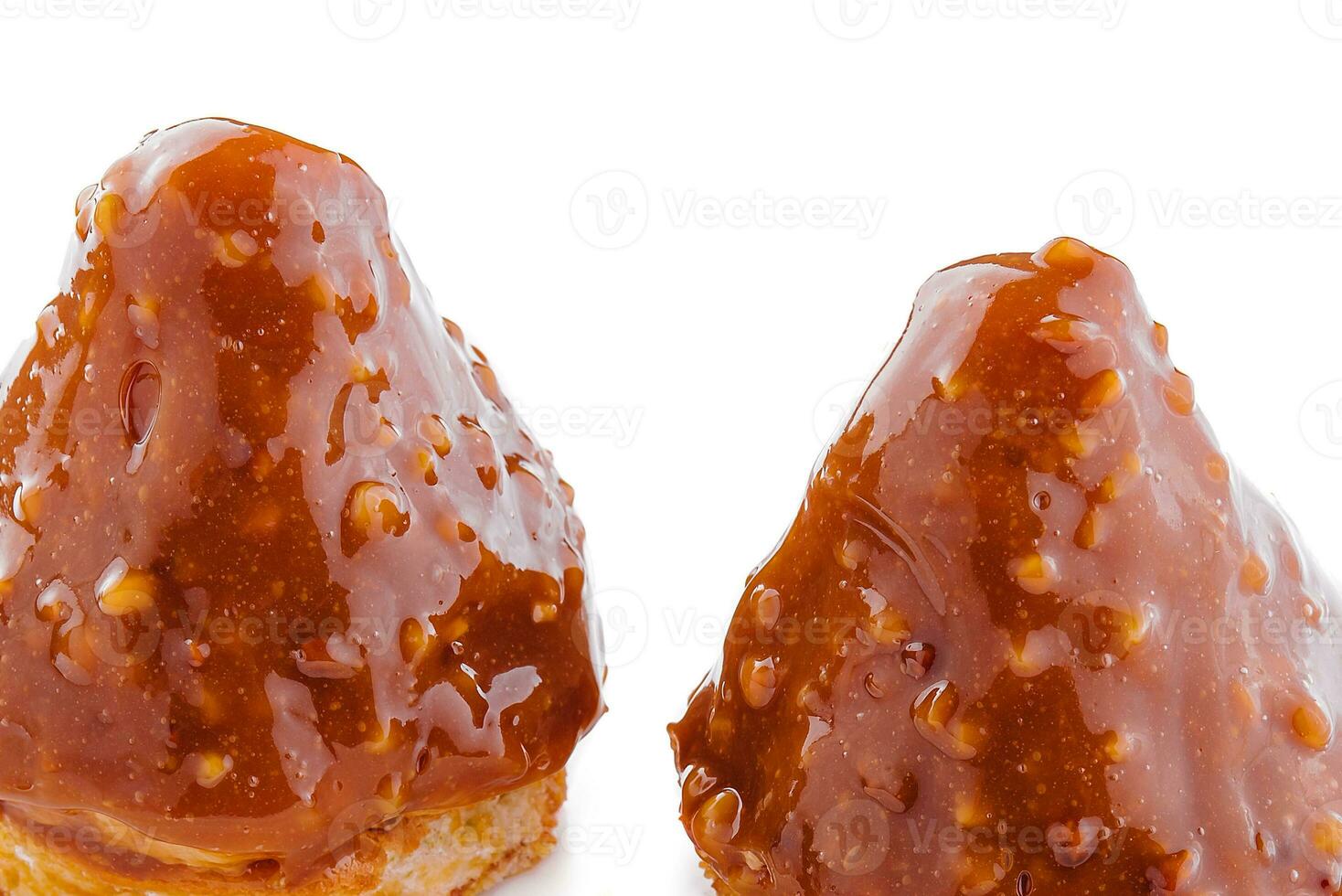 triangular cake with toffee jam on plate photo
