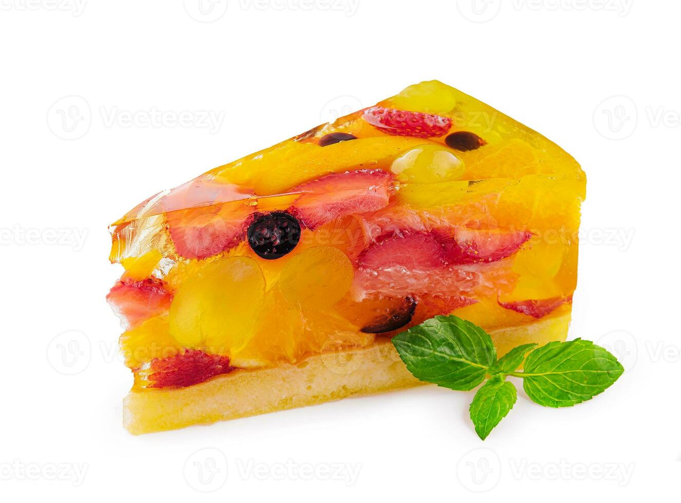 Jelly cake with fruit on white plate photo