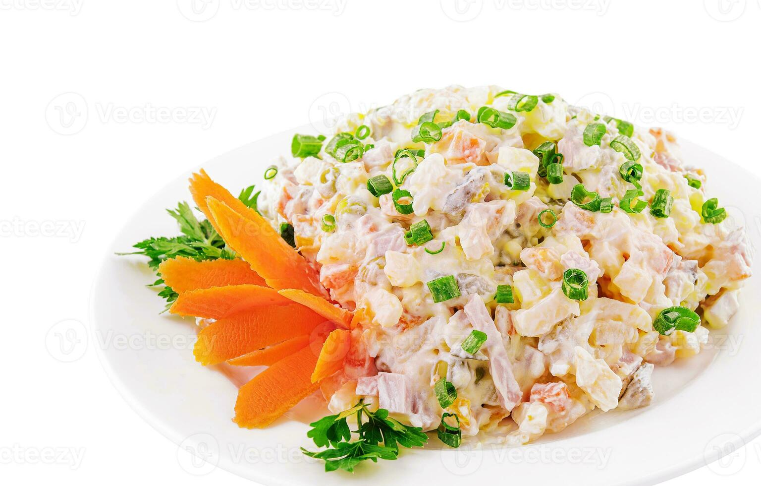 Olivier salad, isolated on white background photo