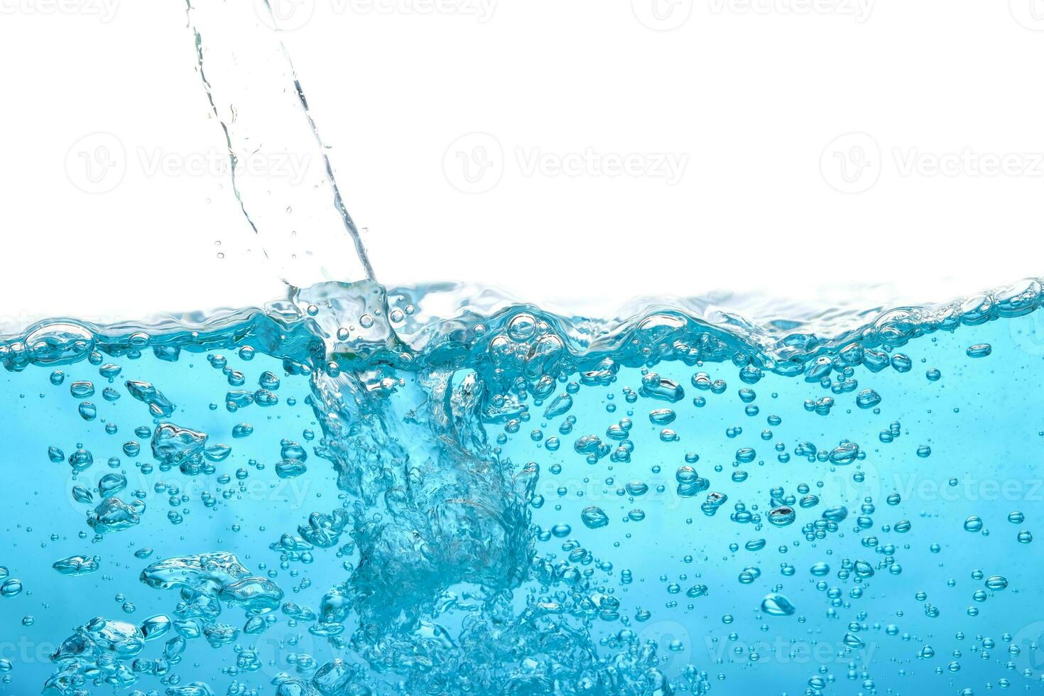 The surface of the water. White background. Movement. Close-up view. photo