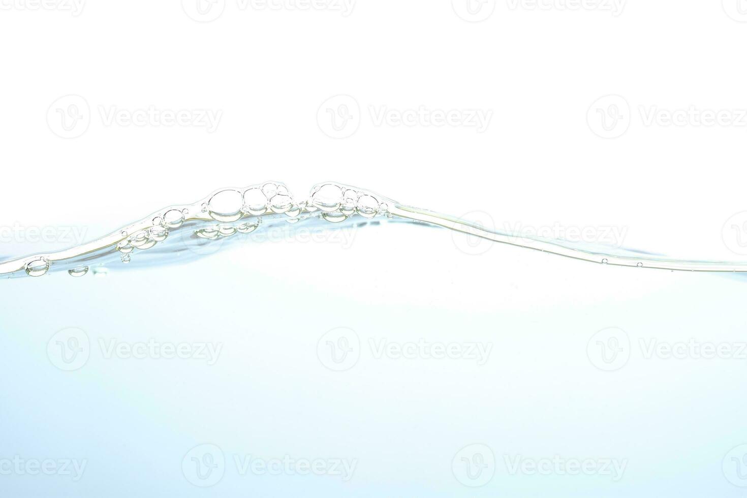 The surface of the water. White background. Close-up view. photo