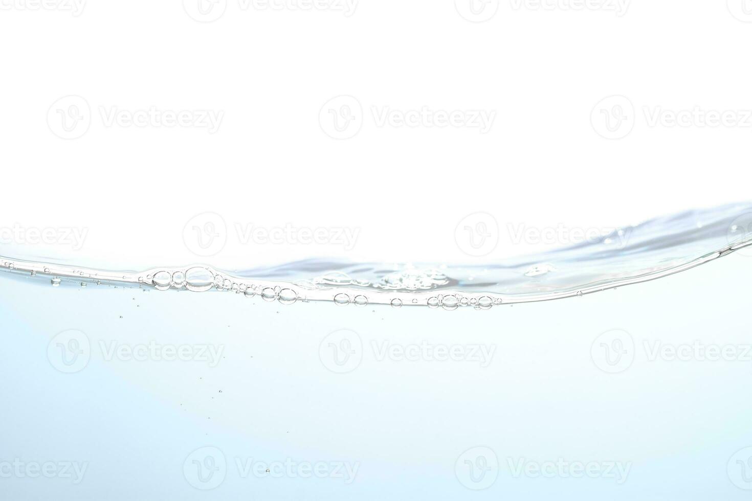The surface of the water. White background. Close-up view. photo