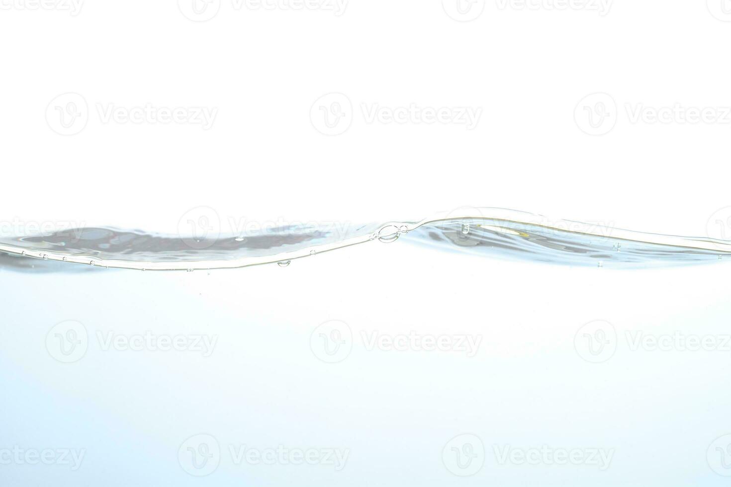 The surface of the water. White background. Close-up view. photo