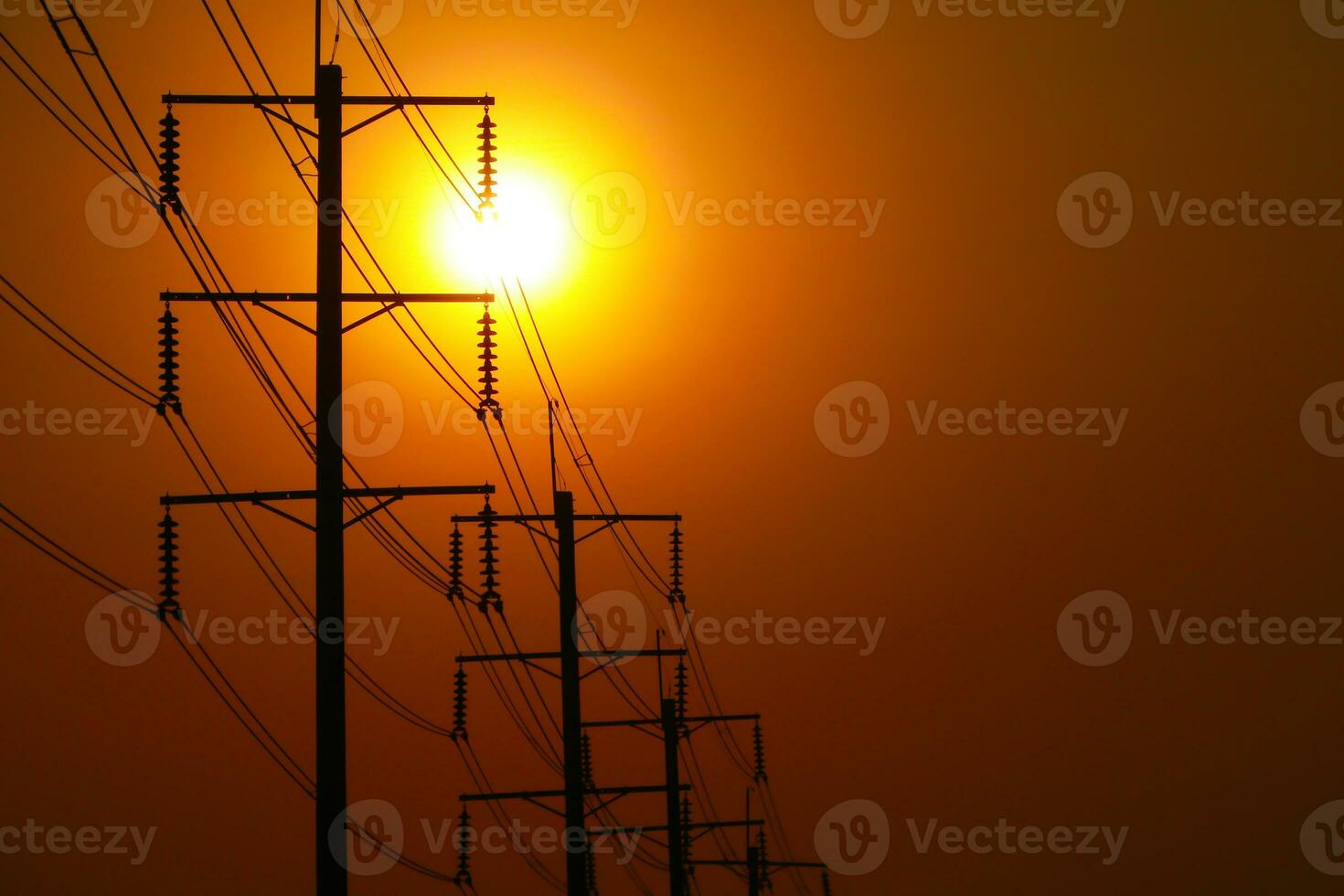 The shadow of the electric pole in the background of the sun photo
