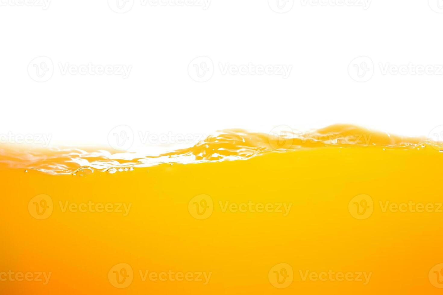 orange juice is isolated on white background. healthy fresh drink and natural waves. close up view. photo
