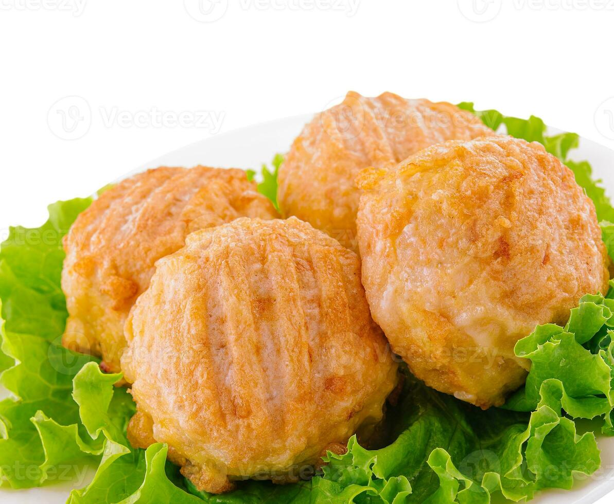 freshly baked homemade cutlets on plate photo