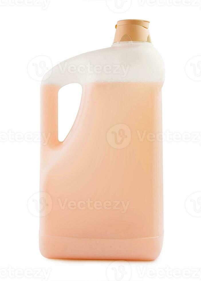 Plastic clean bottle with brown detergent photo