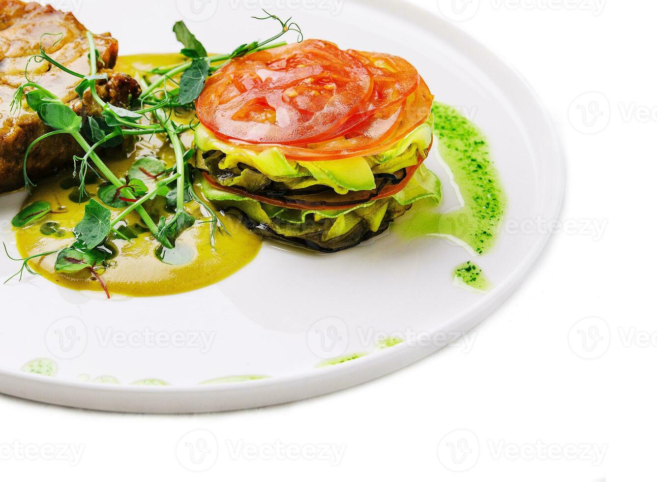 meat steak with grilled vegetables on plate photo