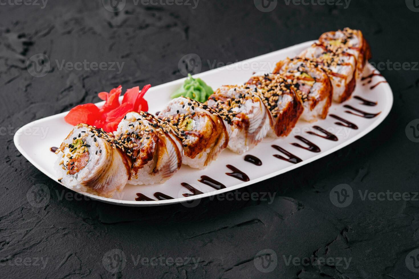 Sushi set canada roll with salmon on plate photo