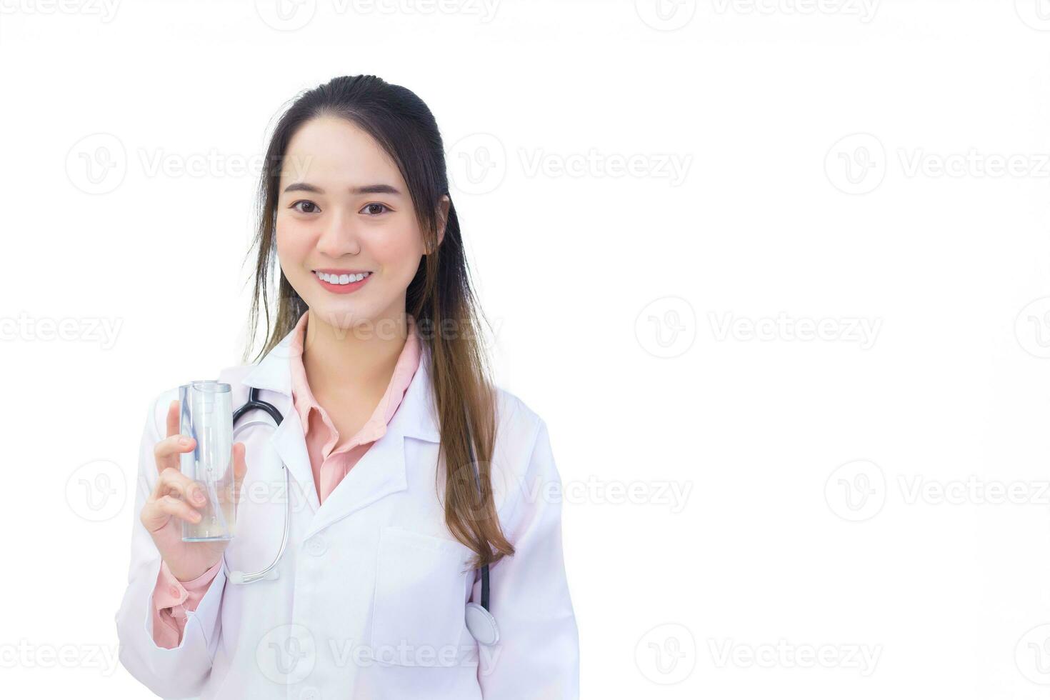 Coronavirus protection concept.  Preventive measures against Covid19 infection. Professional young Asian woman doctor hand uses alcohol gel while isolated on white background. photo