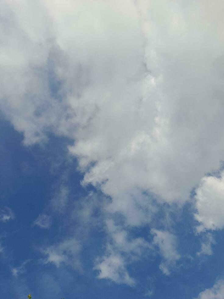 The white clouds on the blue sky are perfect for the background. Skyscape on Lombok Island, Indonesia photo