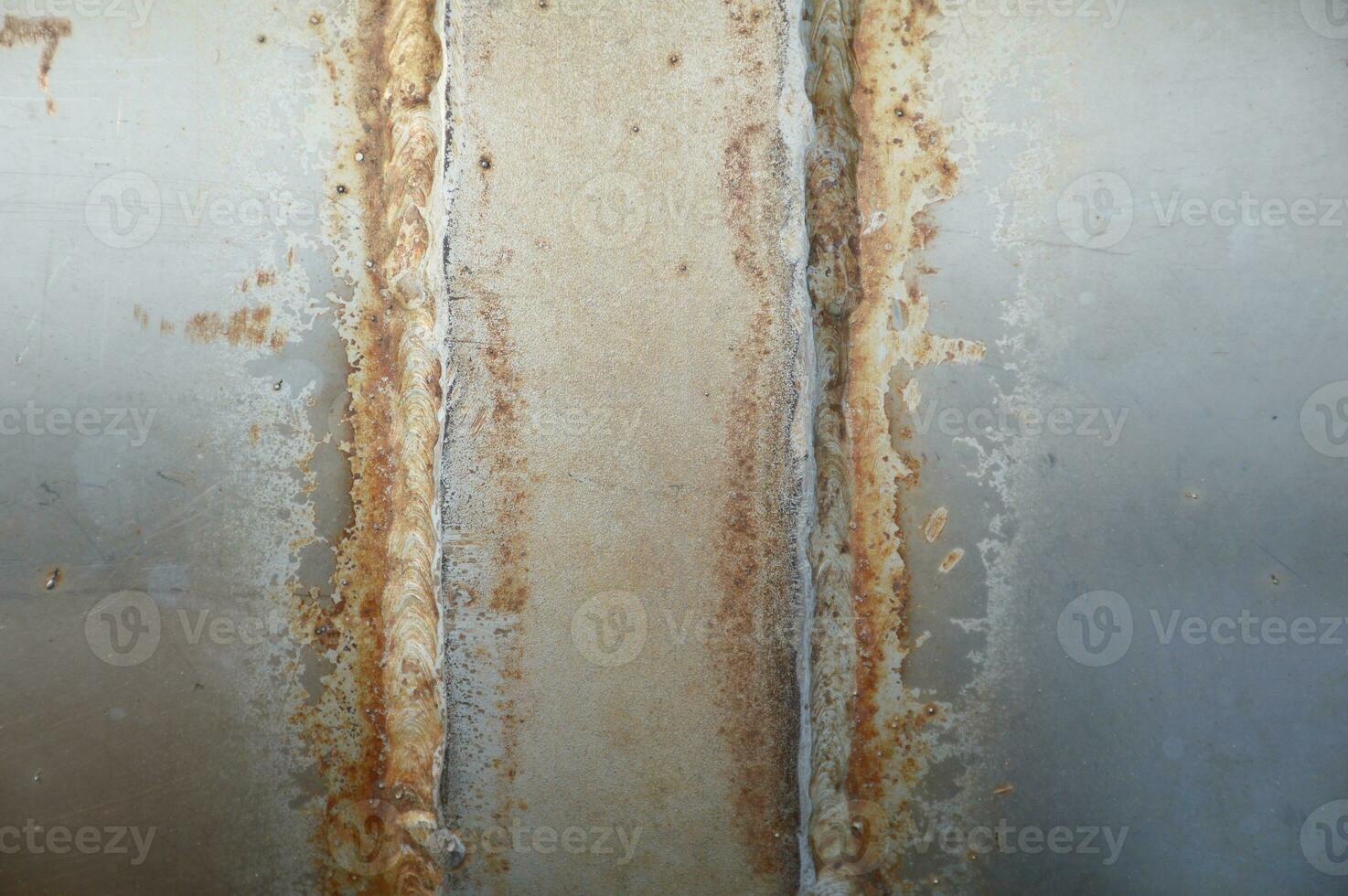 rusty plate with scratches and cracks. photo