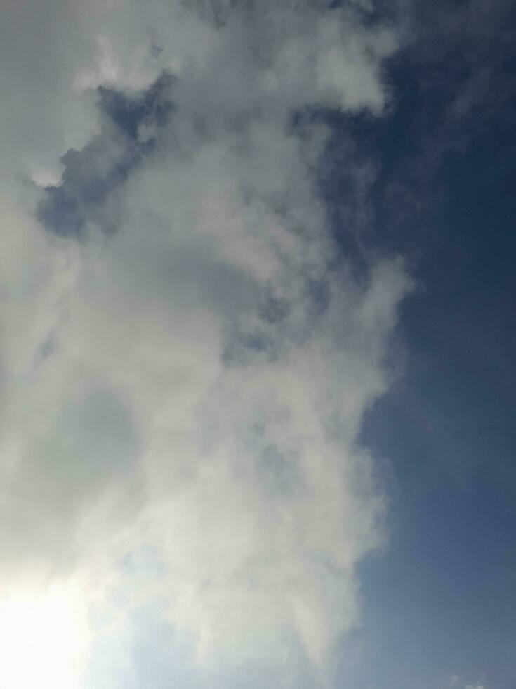 The white clouds on the blue sky are perfect for the background. Skyscape on Lombok Island, Indonesia photo