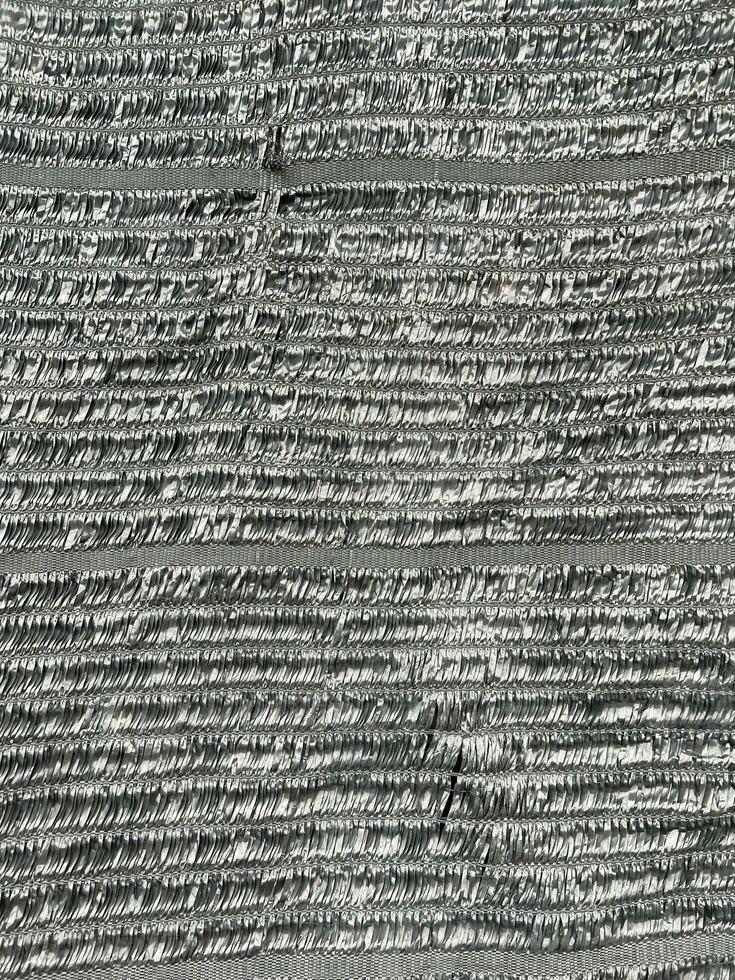 Sun Shade Net, Slan fabric used to filter the light for the plants pattern for background. photo