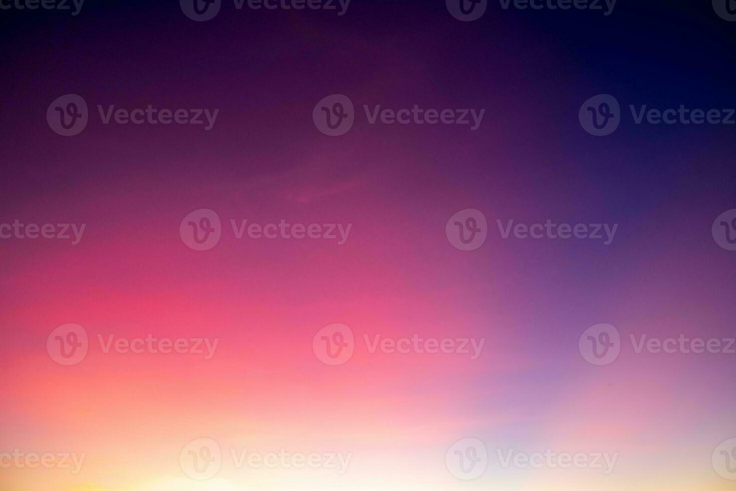 Real amazing Beautiful sunrise and luxury soft rainbow clouds with sunlight on the golden pinkgold sky perfect for the background, Twilight sunset sky with gentle colorful clouds, pastel gradient photo