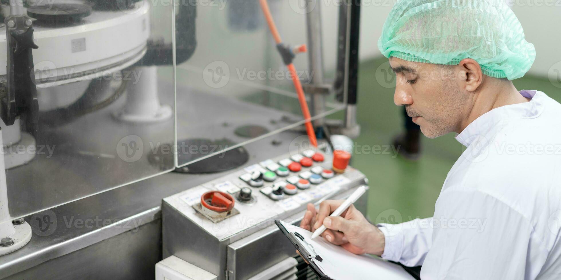 quality supervisor or food or beverages technician change parameter and condition control food or beverages before send product to the customer. Production leader recheck machine and productivity. photo