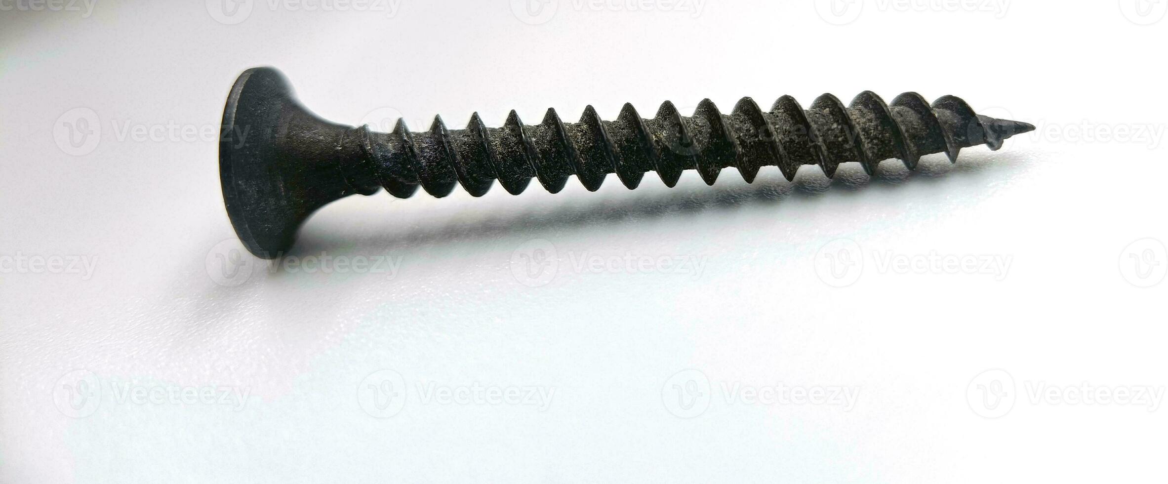 A screw from different perspectives on a white background photo