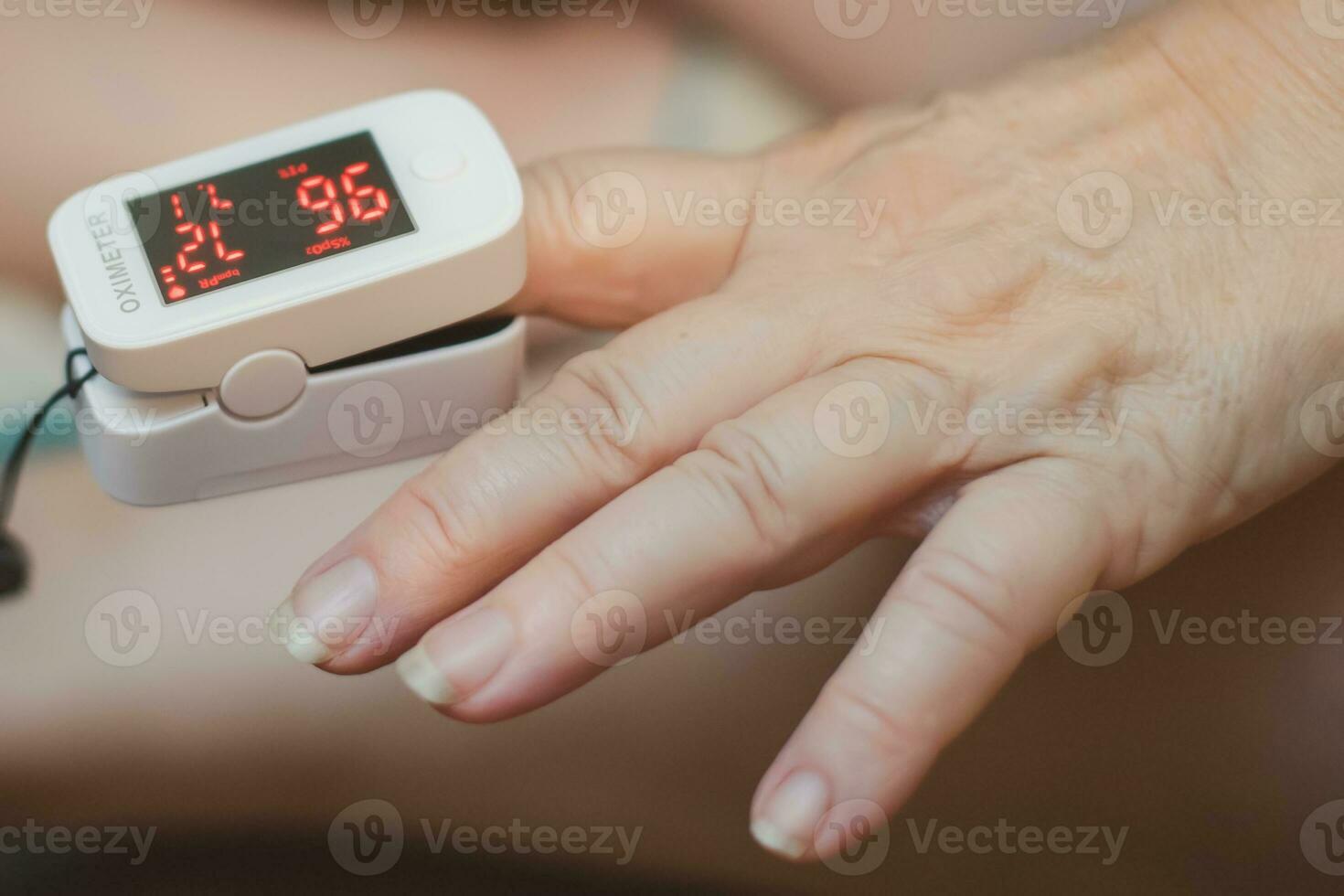 Reduced oxygenation is an emergency sign of pneumonia, for instance caused by coronavirus. Concept of detection of asymptomatic coronavirus. photo