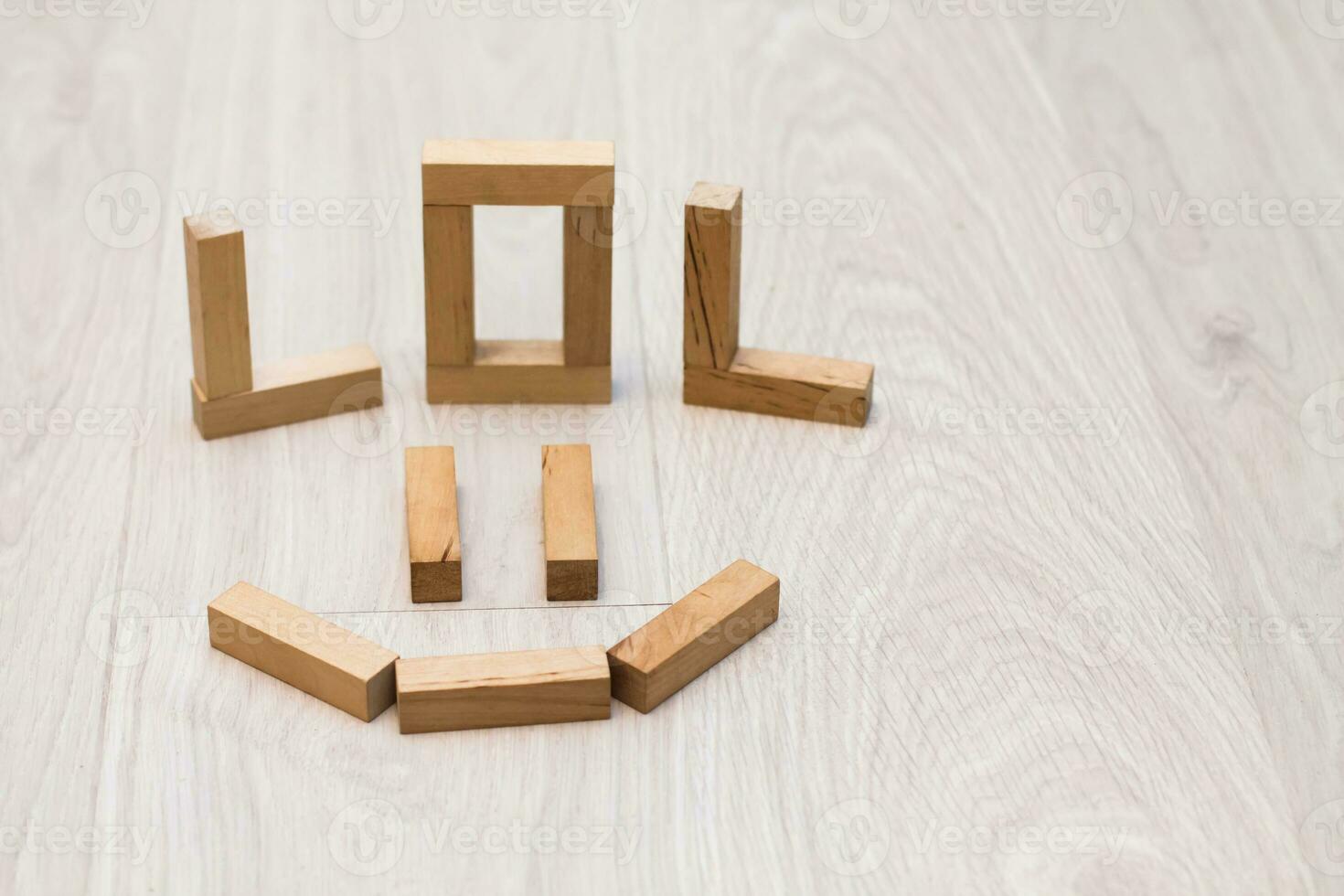 wooden blocks arranged in a smiley face shape photo