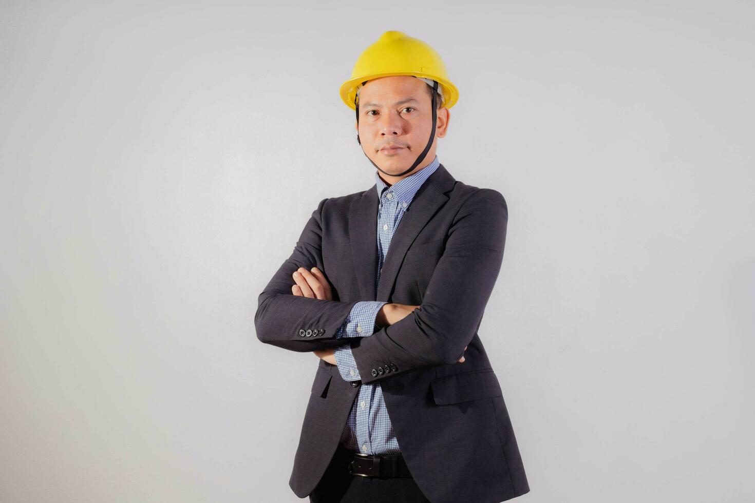 Asian male engineer on white background photo